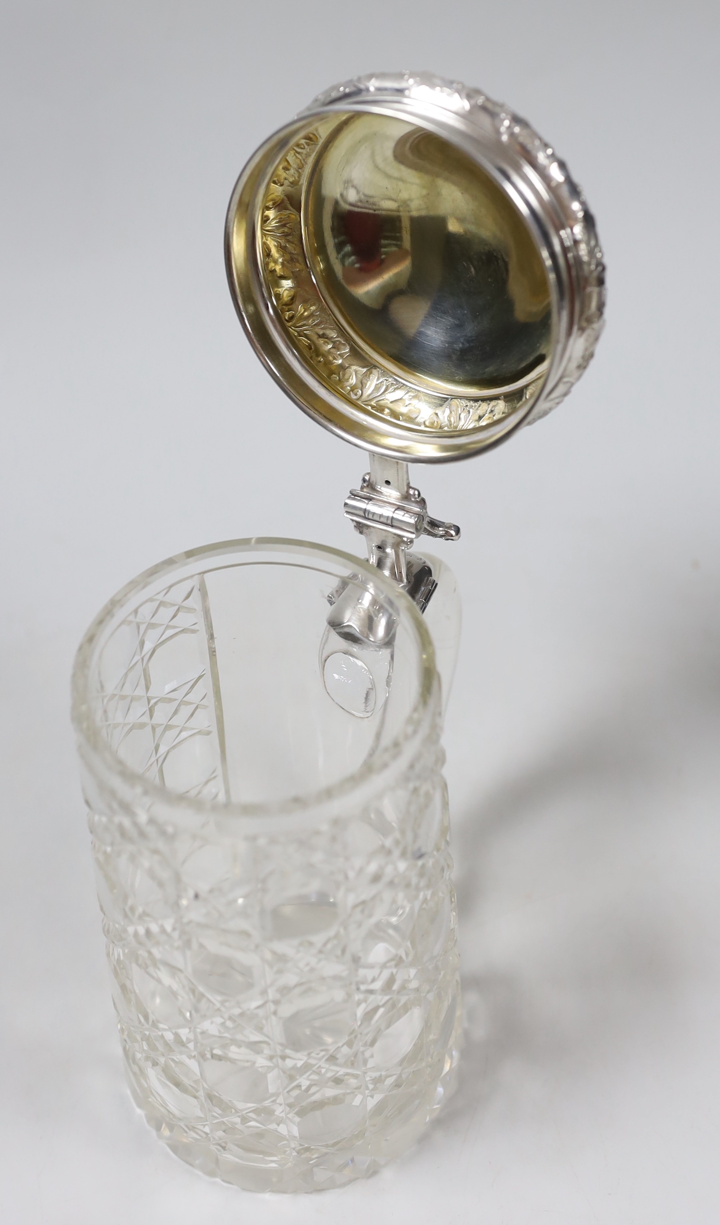 A German 800 standard white metal mounted cut glass stein, height 17.3cm.